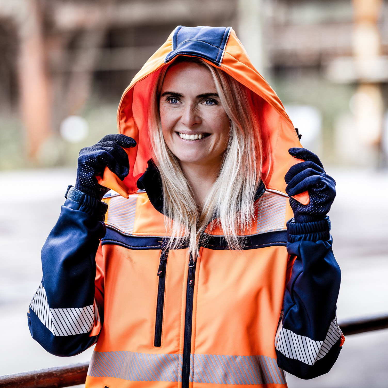 Kapuze MOTION TEX VIZ Warn-Softshelljacke neonorange / marineblau
